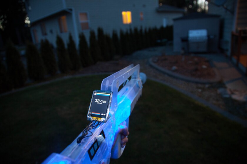 Skirmos, the latest take on the laser tag system, uses a mounted heads-up display (HUD), radio-based dynamic scoring and open-source programming in an attempt bring the complex and diverse experience of the modern multi-player shooter to life