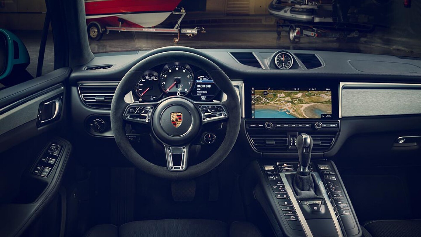 A new GT steering wheel from the 911 an a larger infotainment screen from the Panamera are seen in the new Macan