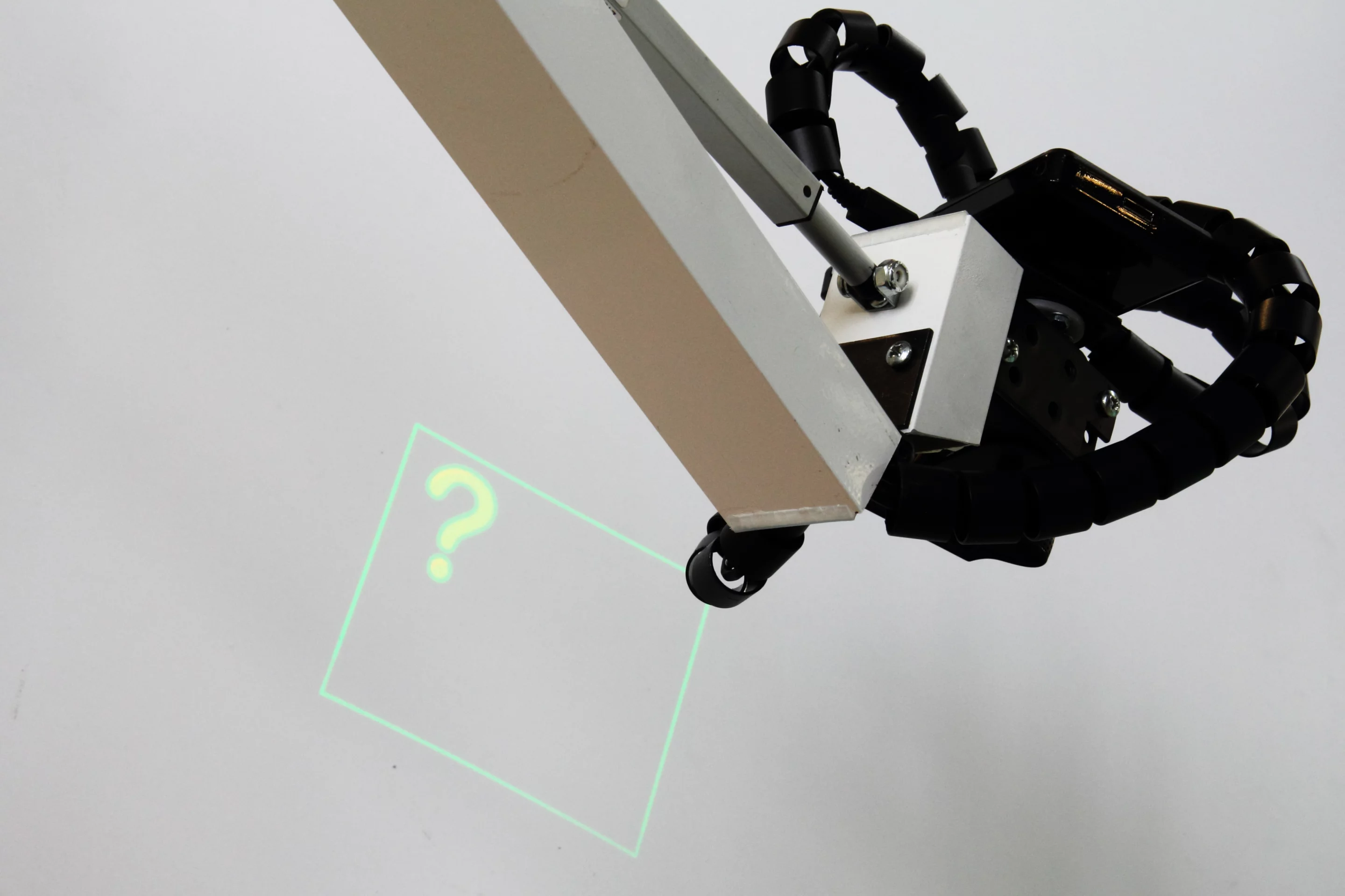 The IBM MRO prototype features a small projector mounted on a robotic arm (Photo: IBM)
