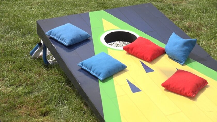 Flop Shot: One side features the standard cornhole game-play