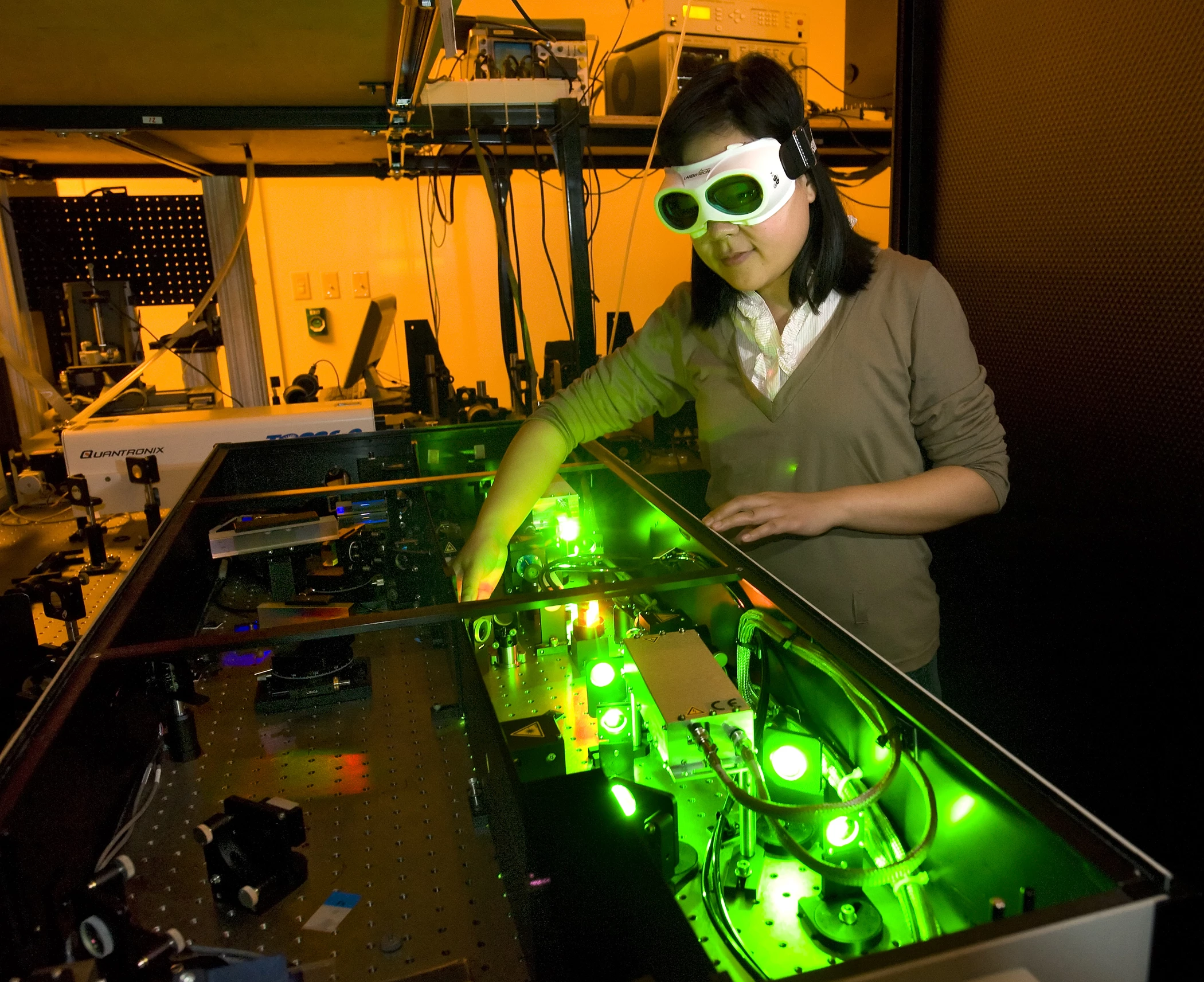 Purdue mechanical engineering student Yaguo Wang works with a high-speed laser at the Birck Nanotechnology Center to study thermoelectric generators (Photo: Purdue/Mark Simons)