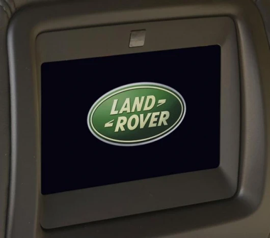 The two 6.5 inch widescreen displays are securely mounted in the front headrests