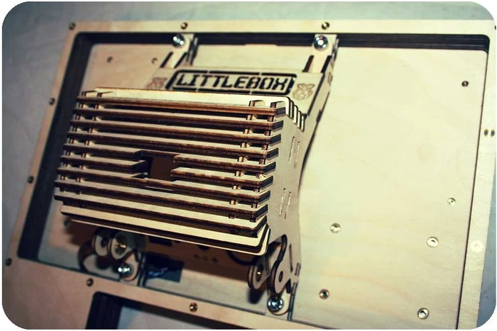 LittleBox is fitted (when you've fitted them, that is) with seven USB ports, a 2.5 W stereo amp and two 5 W speakers