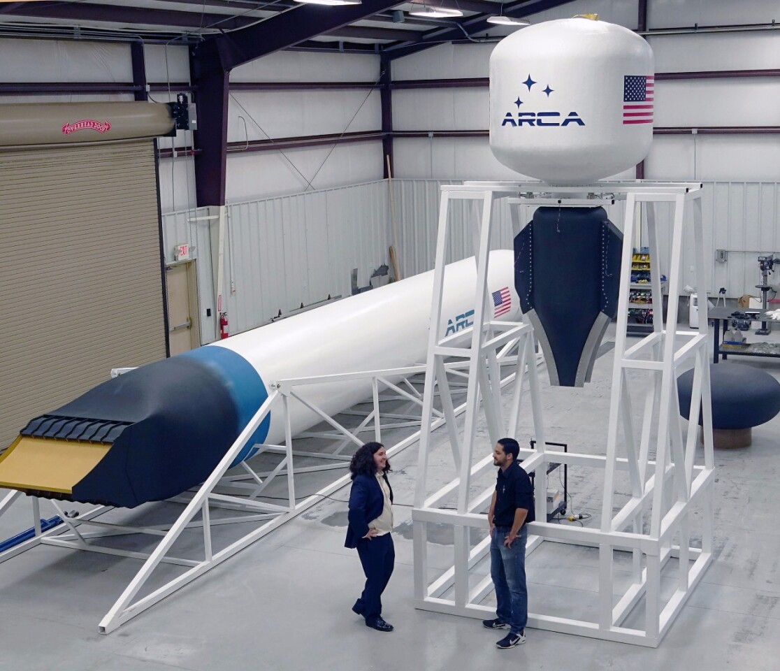 The completed test engine next to a mock up of the Haas 2CA rocket