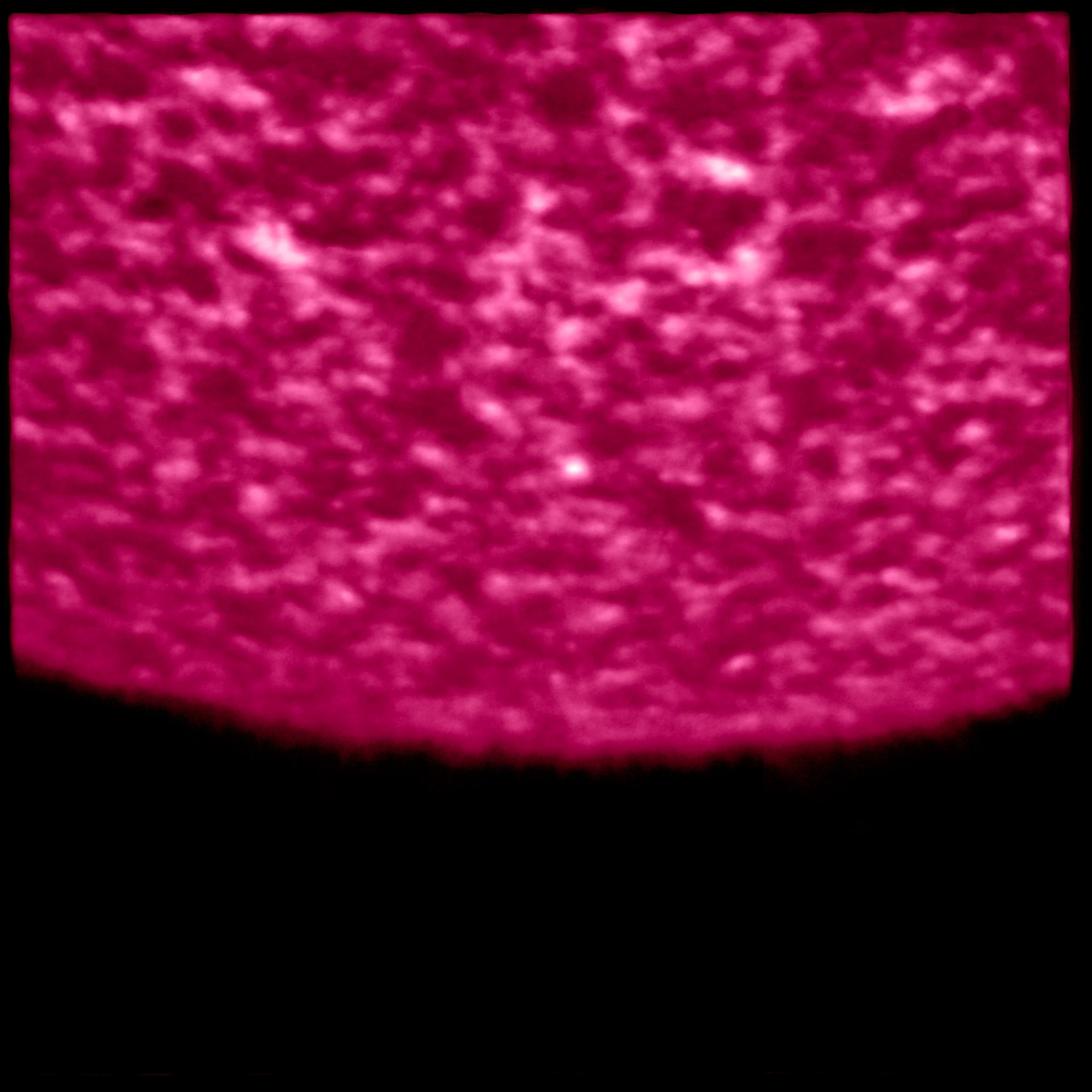 This image, captured in the Lyman-Alpha wavelength, highlights the structure of a region of the Sun's atmosphere known as the chromosphere, which lies beneath the corona.