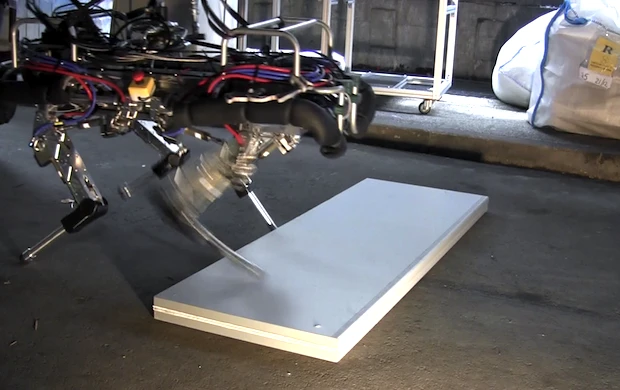 The Italian Institute of Technology's HyQ quadruped robot steps over an unseen obstacle automatically using its new step reflex algorithm