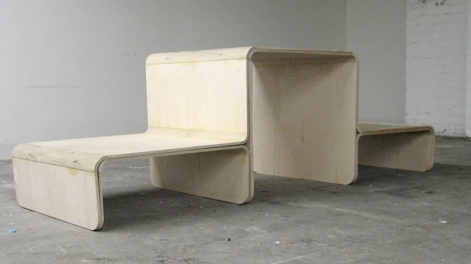 The ottoman and coffee table of the Slot Sofa