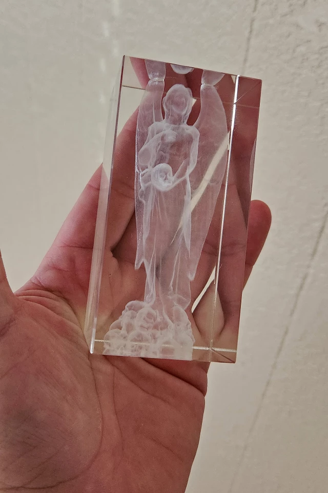 It took almost exactly one hour to engrave this "angel of death" into the crystal. It was a very detailed STL file. The results look REALLY cool
