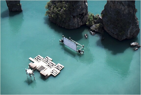 Archipelago Cinema features a large floating projection screen and a floating raft made from recycled materials