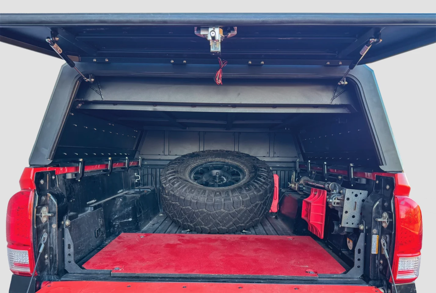 Though the tent causes the Trailster to sit lower than other caps, it still leaves plenty of bed space open for gear and cargo haul
