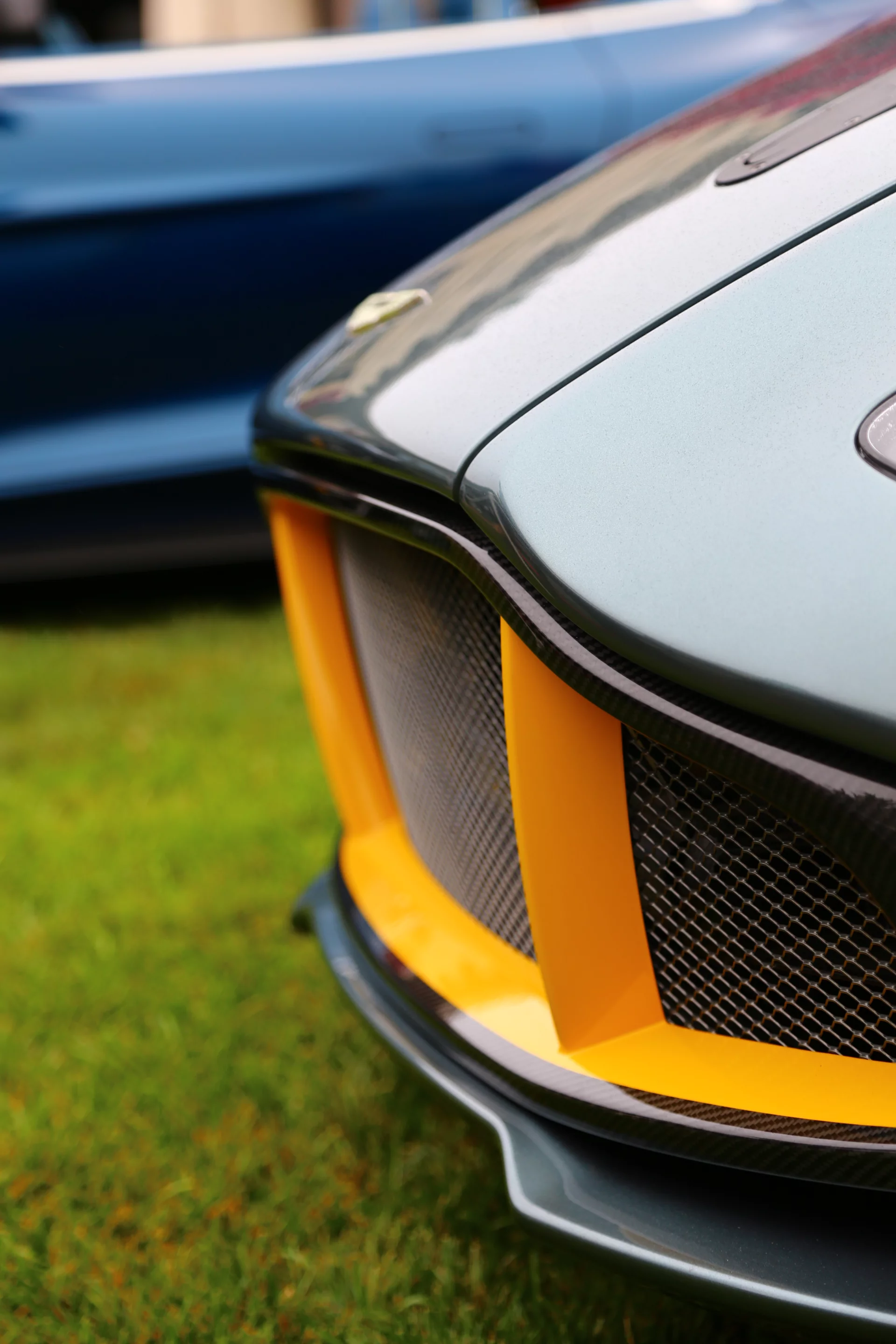 Aston Martin's signature race colors and 100 year anniversary decals populate the carbon fibered body (Photo: Angus MacKenzie/Gizmag.com)