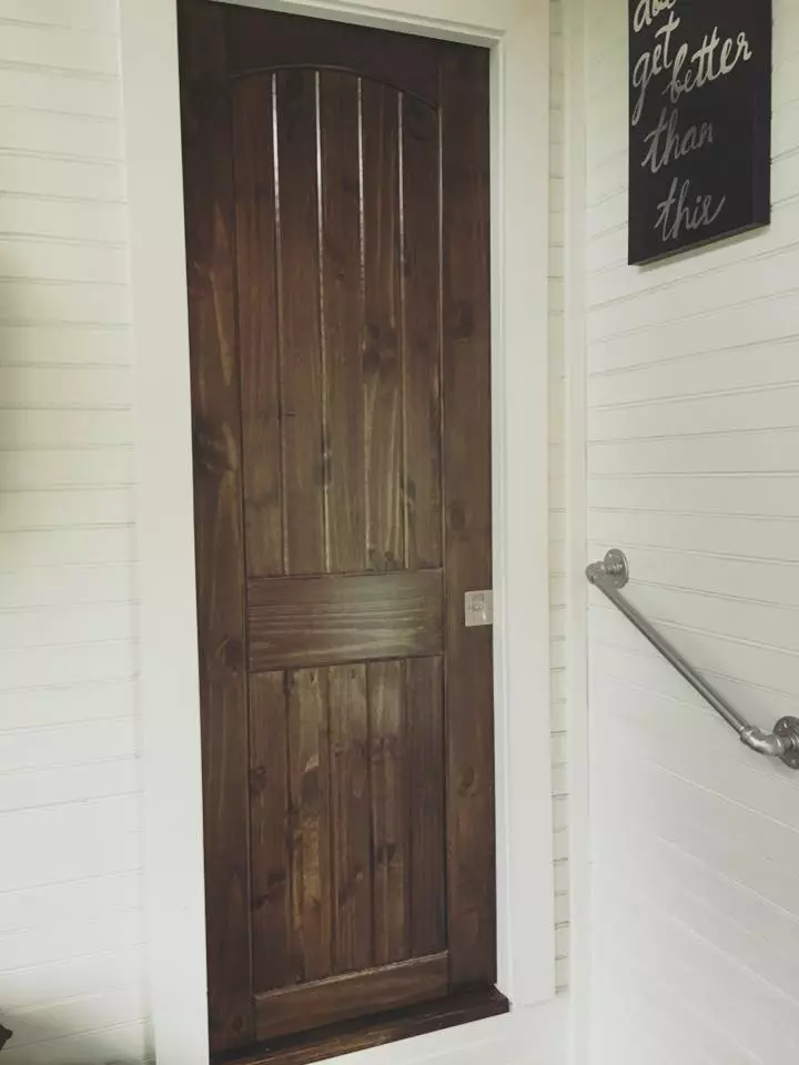 Entrance to the bathroom is gained via pocket door