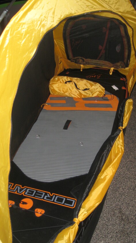 It's not the roomiest tent, but it should be comfy for the one person that's using the paddleboard