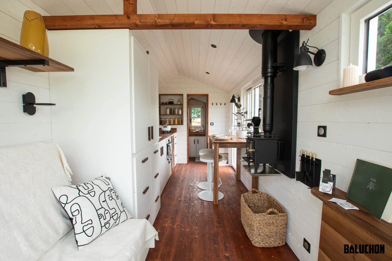 The Moulinsart's interior decor is quite rustic and includes wooden beams and walnut furniture