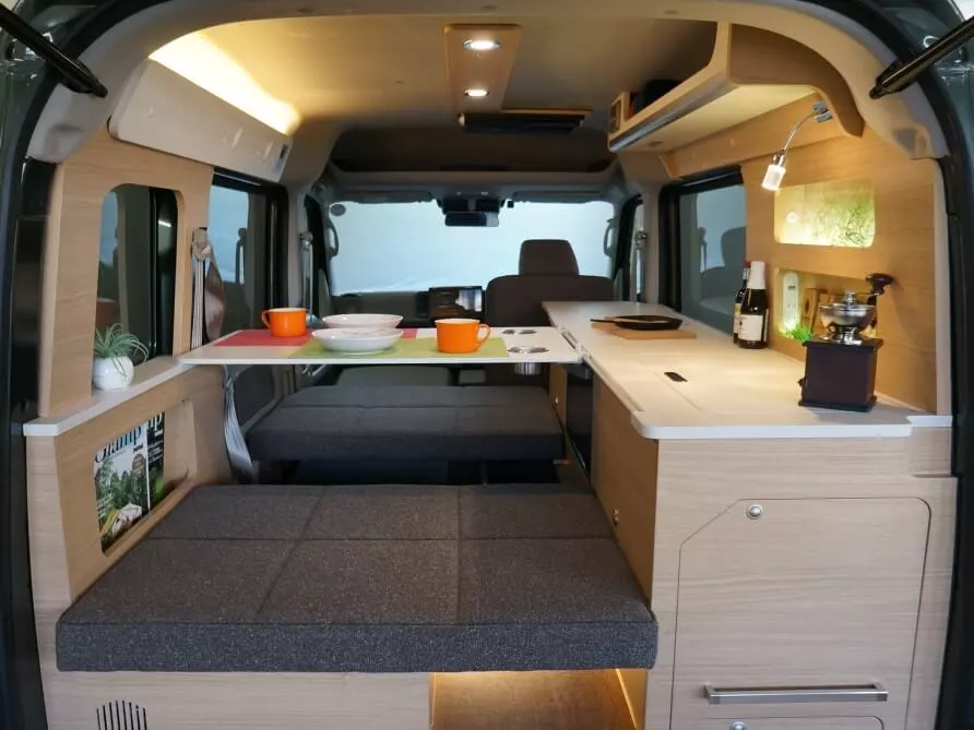 The cushions and removable table easily arrange into a vis-a-vis dining layout