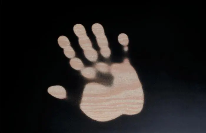 A hand print, left on the thermochromic table