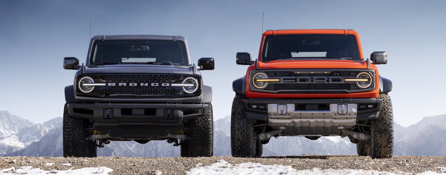 The Bronco Raptor on the right certainly looks taller, broader and tougher than the already-rugged Bronco