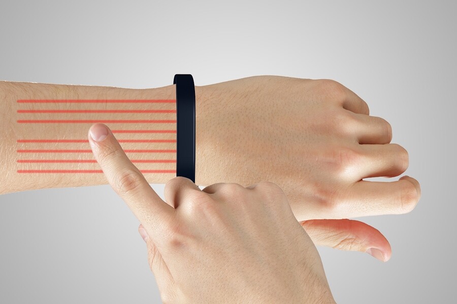 The Cicret Bracelet's proximity sensors work out where the user's finger is and allows them to interact with the display like any other touchscreen