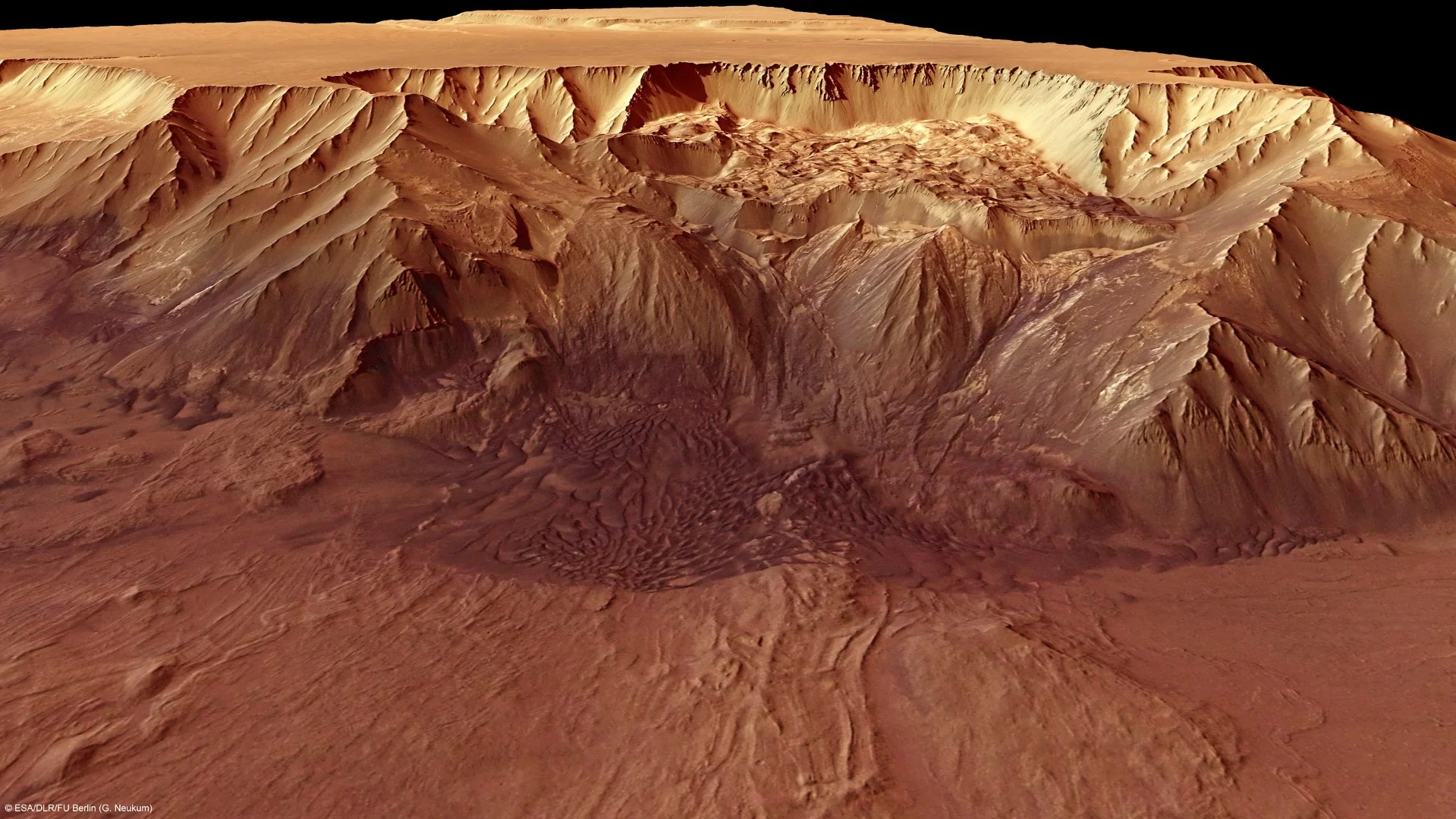 Melas Chasma is part of the huge Valles Marineris rift valley on Mars. Melas Chasma itself sinks 9 km below the surrounding surface, making it one of the lowest depressions on the planet (Credit: ESA/DLR/FU Berlin (G. Neukum), CC BY-SA 3.0 IGO)