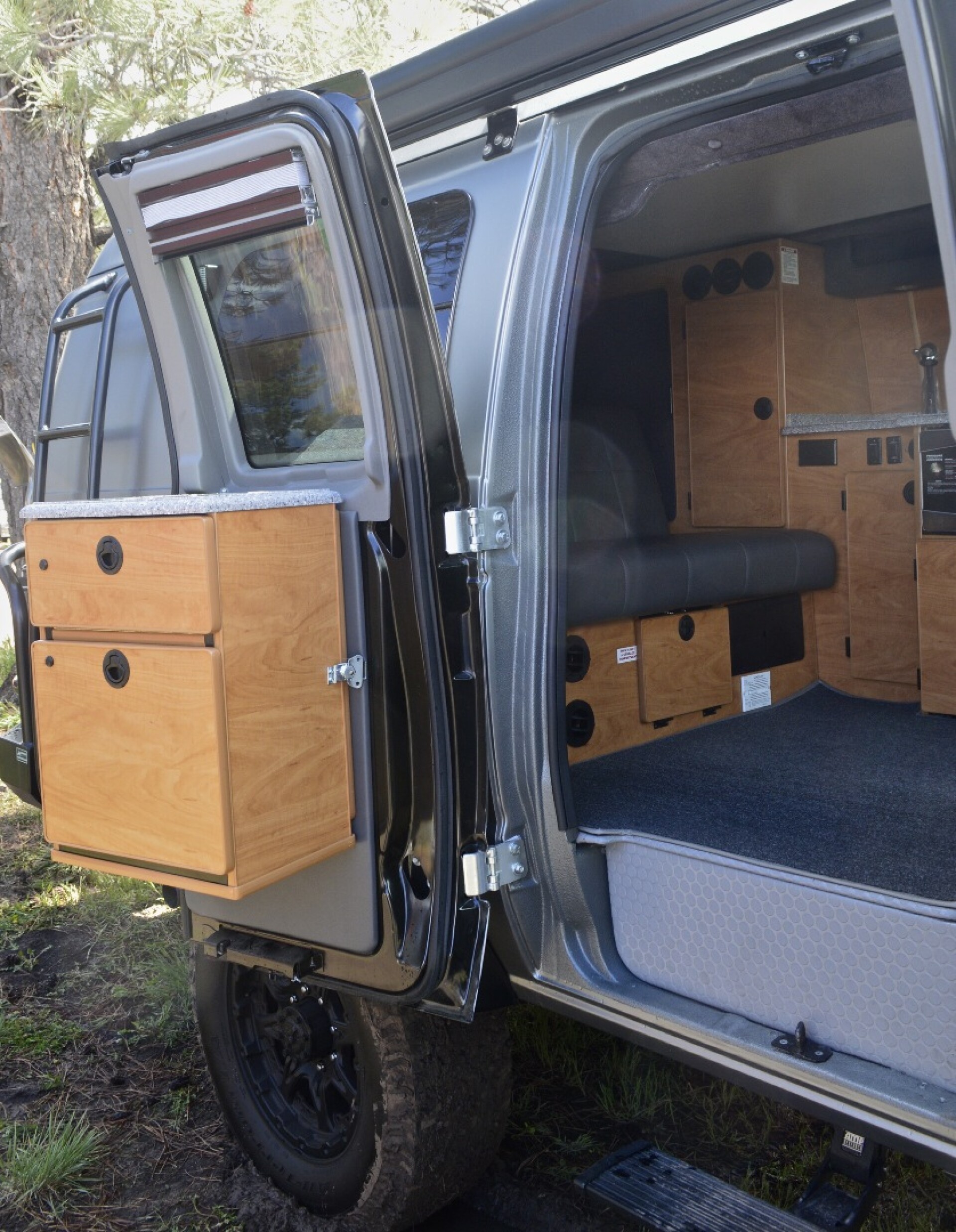 Sportsmobile builds custom fiberglass cabin for new camper van
