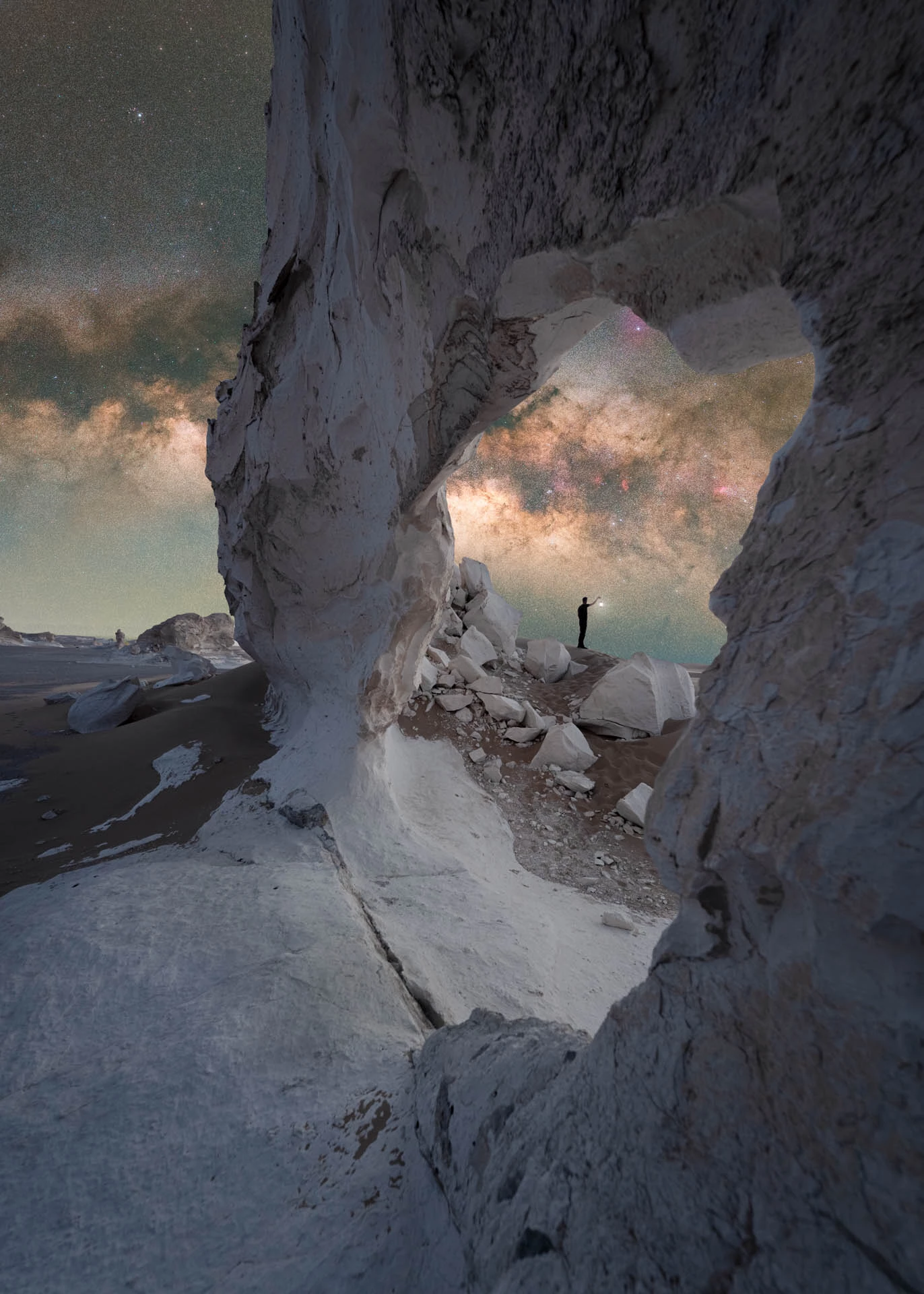 Egyptian Nights. The Milky Way peeks through a rock formation in Egypt's White Desert