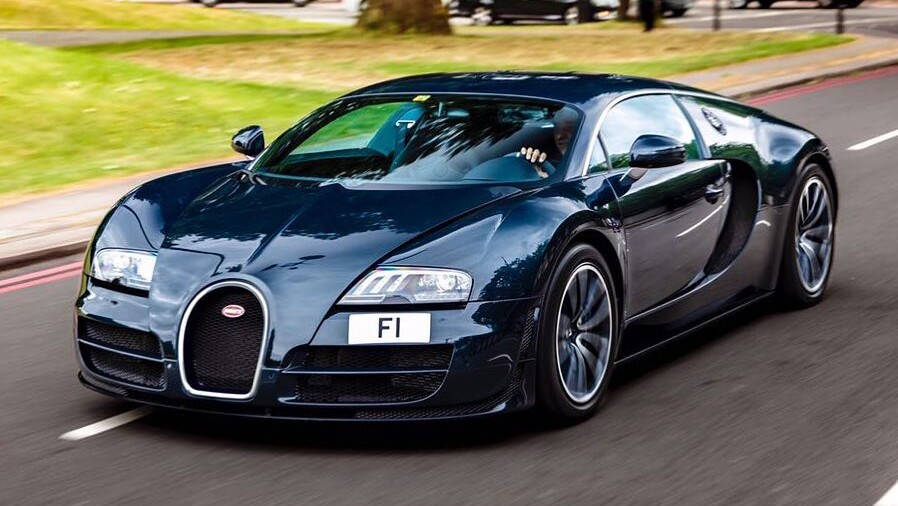 Afzal Kahn in his Bugatti Veyron that wears his much sought-after "F1" plate