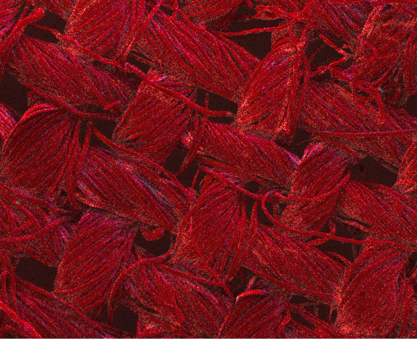 Red indicates the coverage of silver nanoparticles in a fabric in this image that's been magnified 200 times