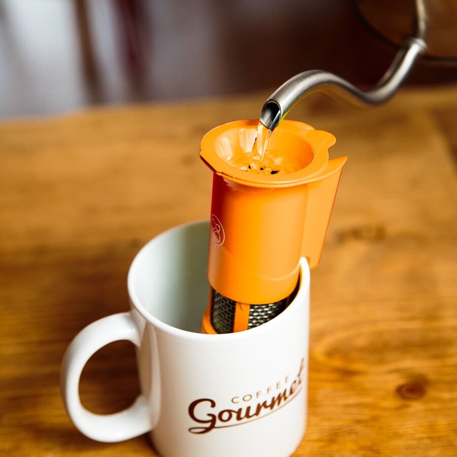 The Coffee Gourmet uses a constant flow of near-boiling water to help the coffee grinds bloom and push the liquid through the filter (Photo: TS Design)