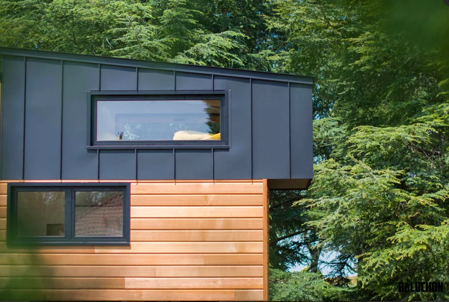 The Piccola Casa's bedroom juts out over the back of the tiny house