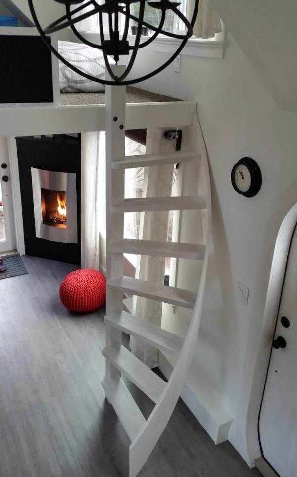 Two slimline ladders lead to two separate elevated loft spaces