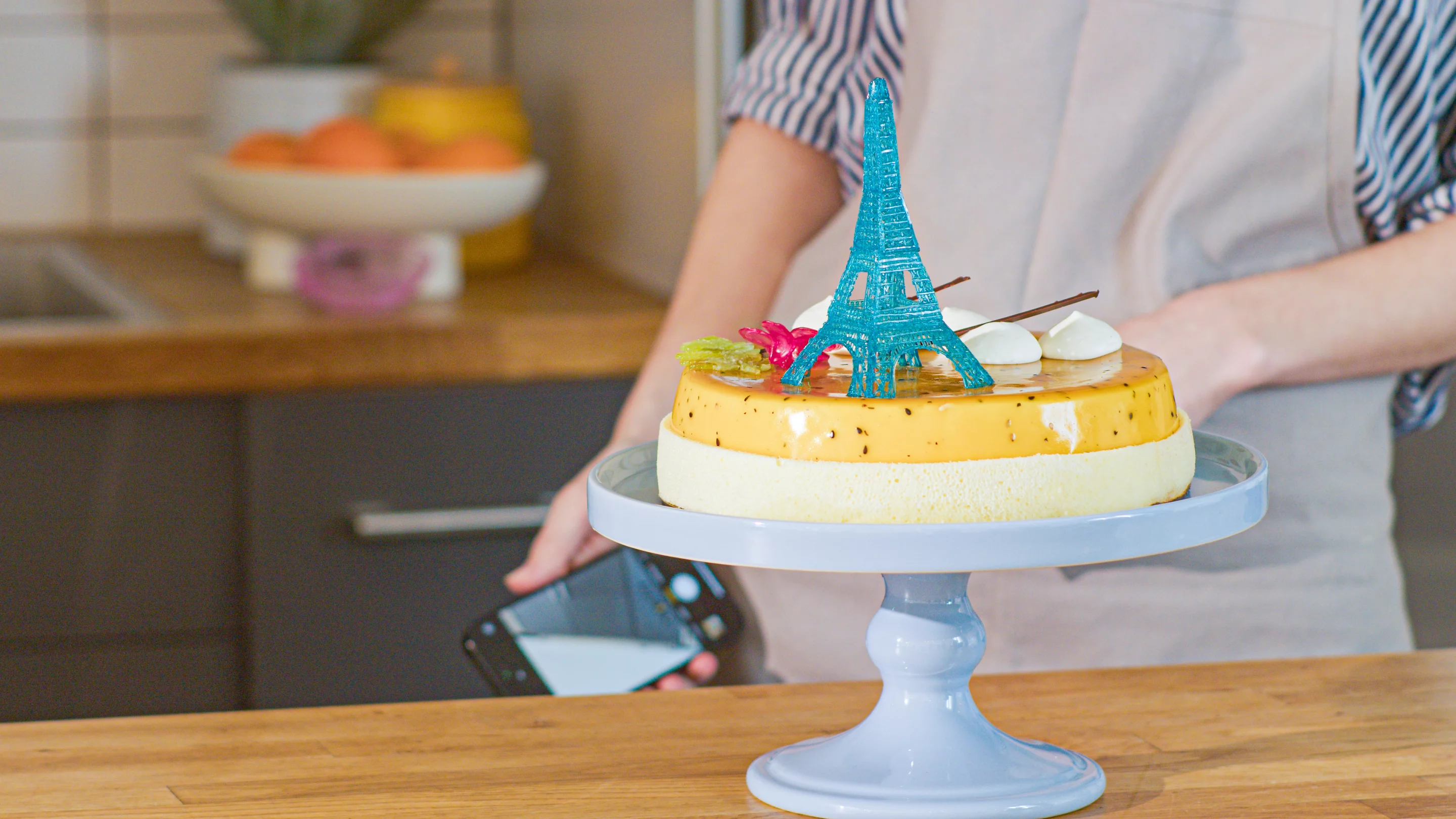 An Eiffel Tower atop a cake courtesy of the ChefDoodler