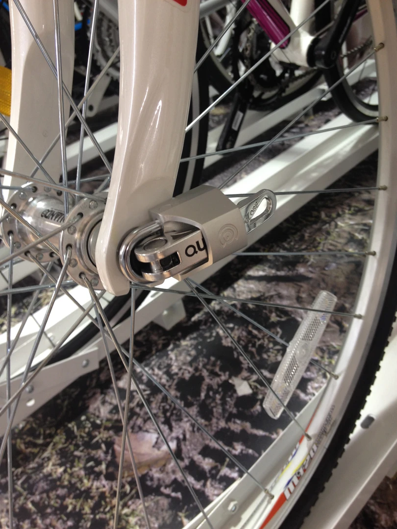 Quick Caps make it impossible to pull open a bike's quick-release wheel levers – without the key