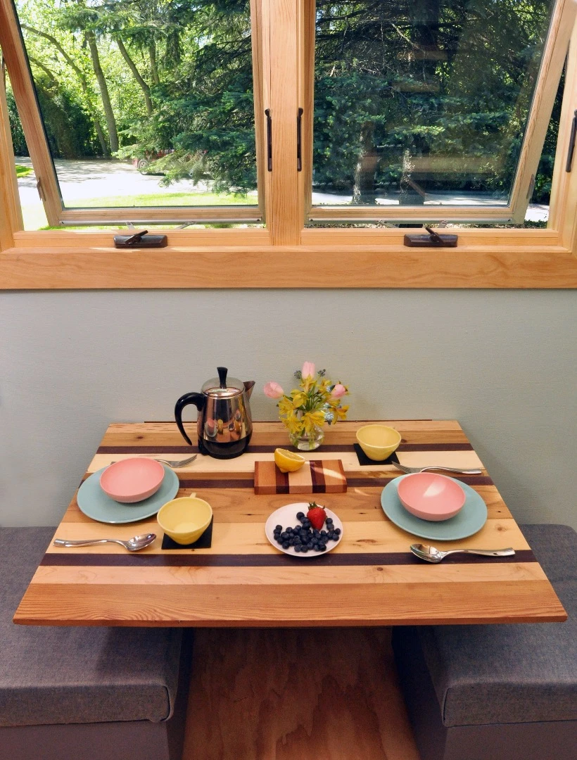 A small dining table doubles up as a work space