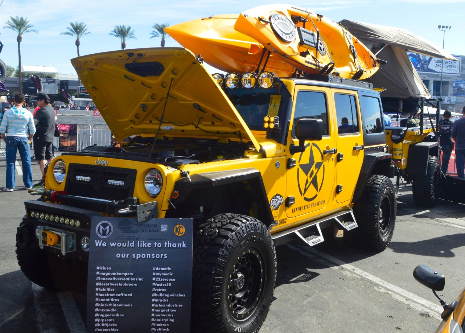 To Extreme Off Road Jeep Wrangler with the company's Rugged 'n Ready trailer in back
