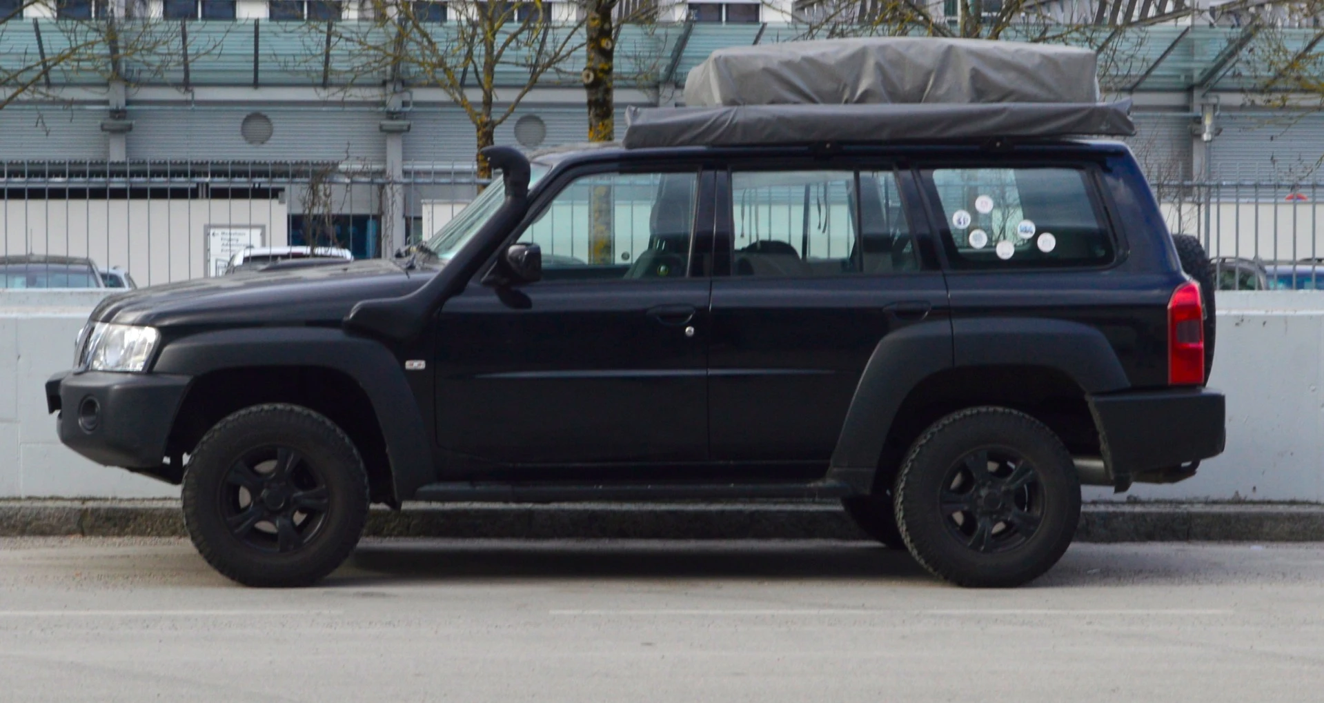 We stepped outside for a bit of fresh air only to see one of the cooler adventure vehicles at the show just parked there - a Nissan Patrol all outfitted for overlanding and/or multi-day camping trips