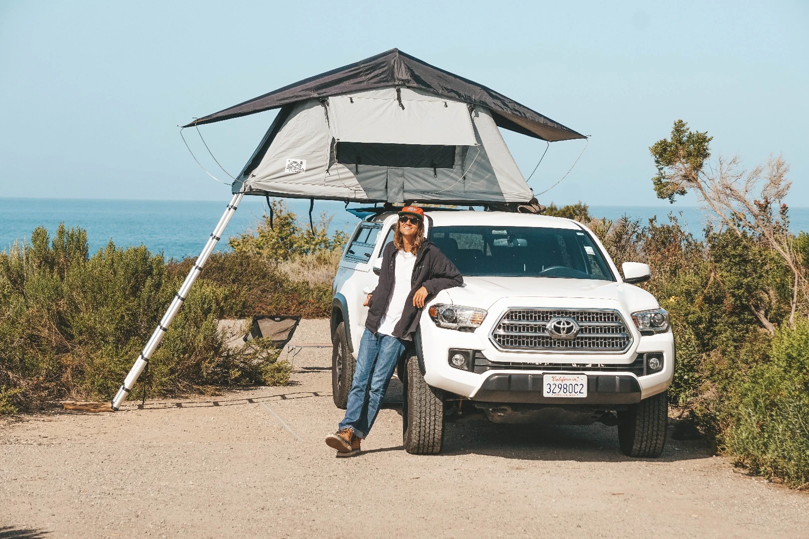 Ryan Minarik poses with the Nesty roof-top tent