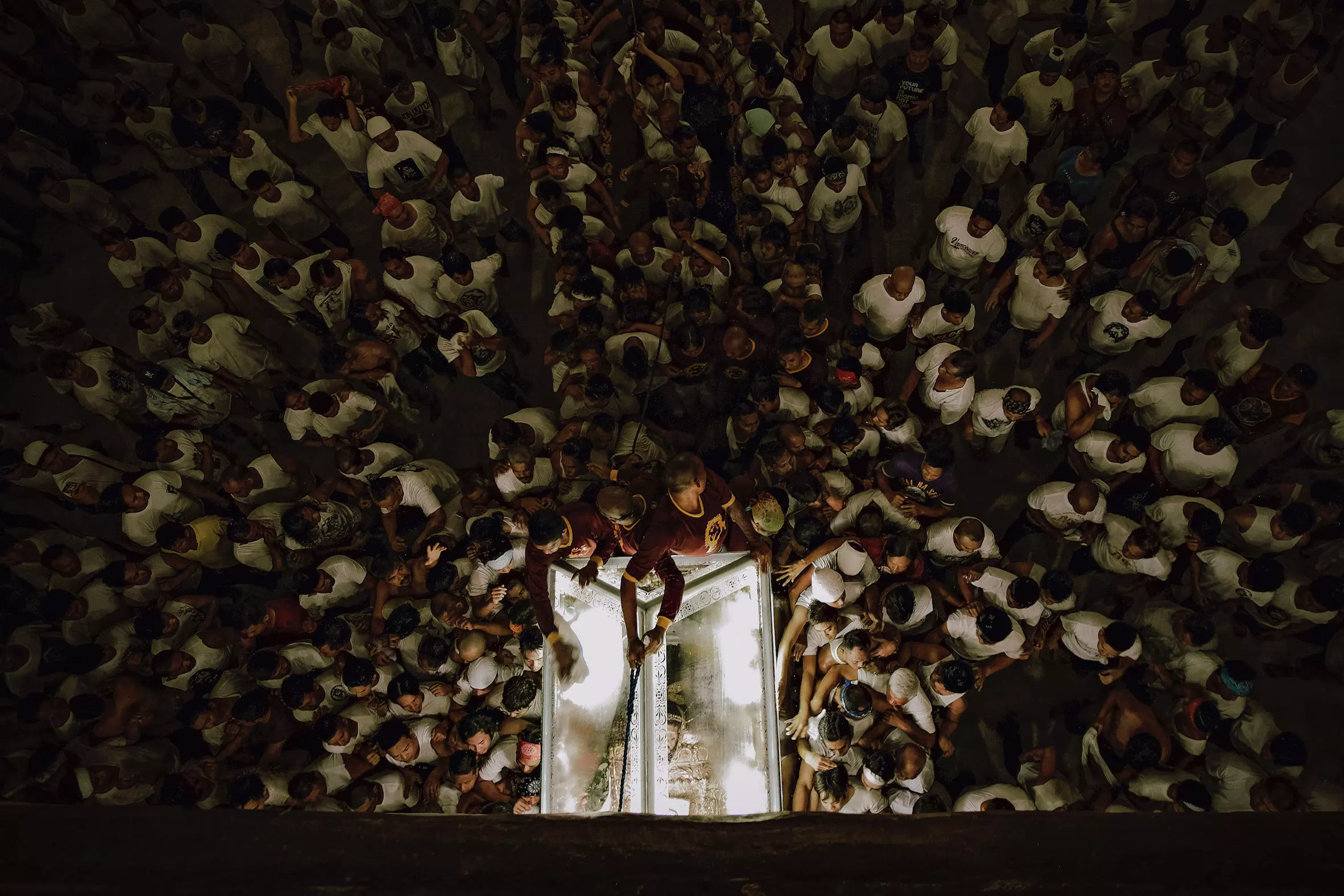 Winner in ‘The Photojournalist’ category. This incredible series documents an annual religious ritual in Lucban, Quezon Philippines. A procession moves a glass coffin carrying an image of Jesus Christ through the town. Participants believe the tradition will bring luck and success.
