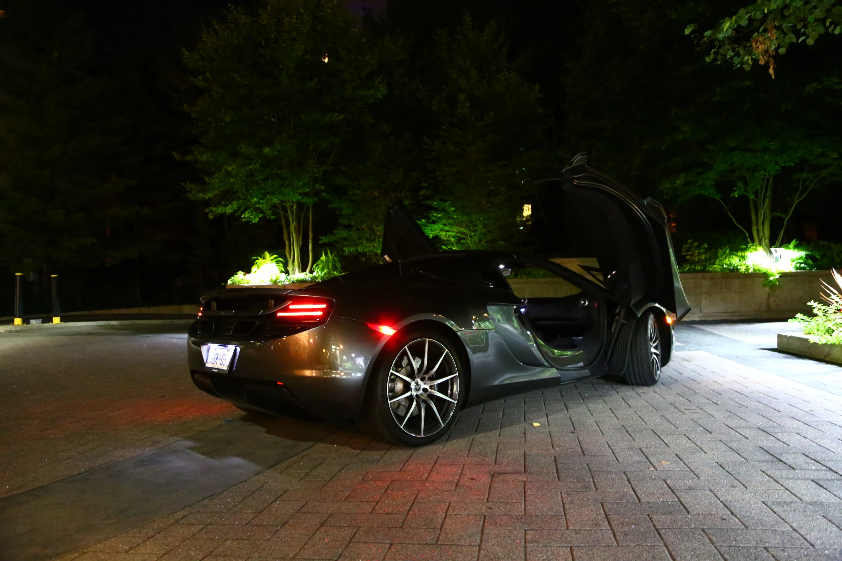 Dihedral doors and low running boards provide relatively easy access to the 12C's cockpit (Photo: Angus MacKenzie/gizmag.com)