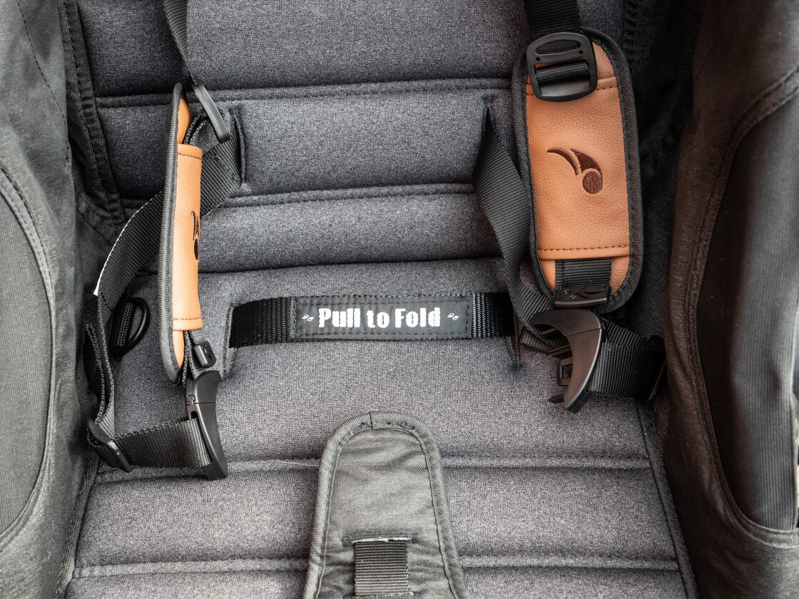 The pull to fold strap is the greatest strap in this world.