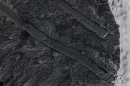 A microscope image of compromised dentin tubules that have been protectively plugged by the CalBots