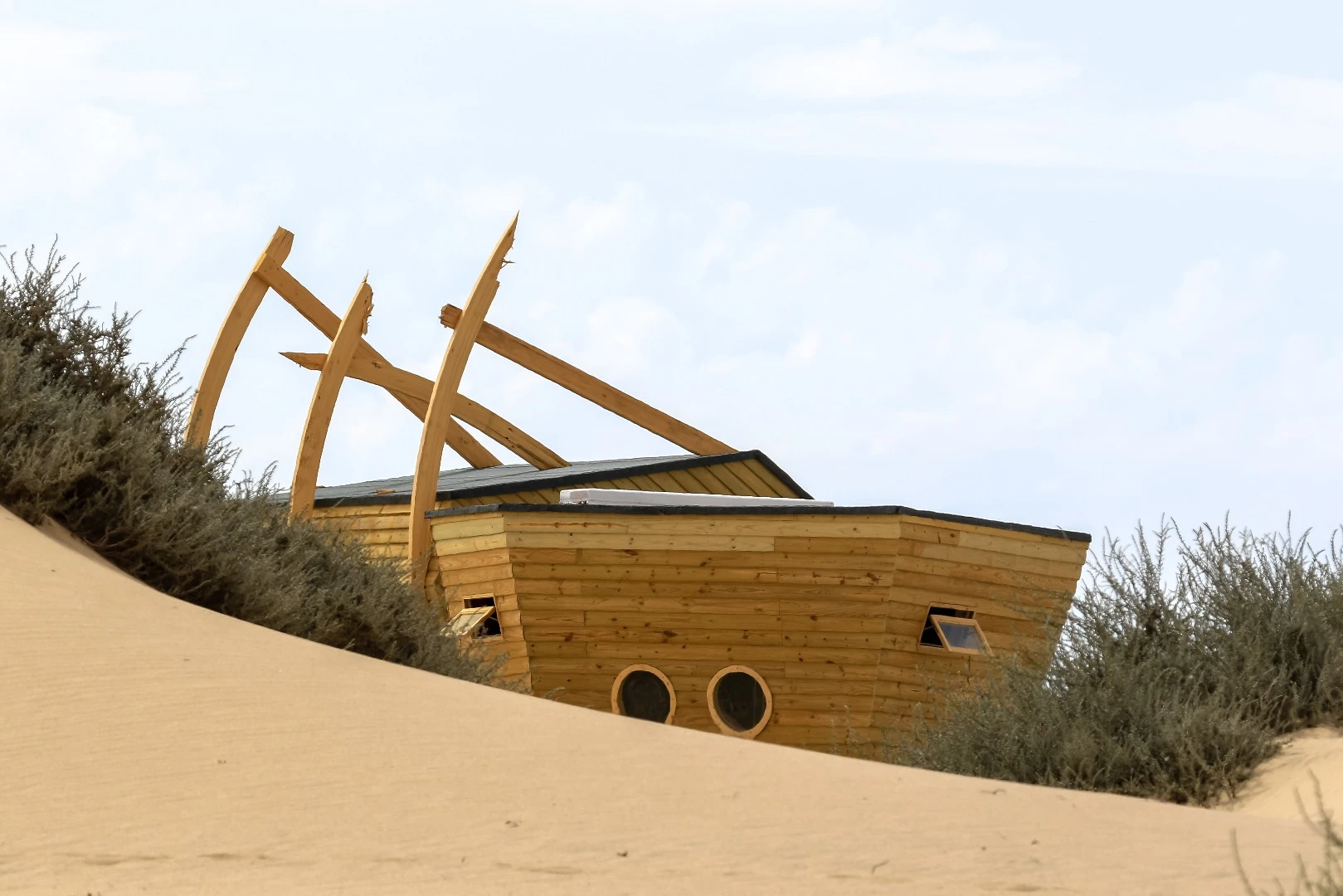 The solar-powered chalets making up Shipwreck Lodge in Namibia are built to mimic fallen ships
