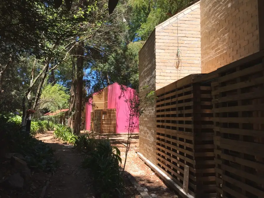 This low-cost home by Mexican architect Tatiana Bilbao costs just US$8,000 to build, and comprises a central core built from concrete blocks, with surrounding modules constructed from wooden pallets
