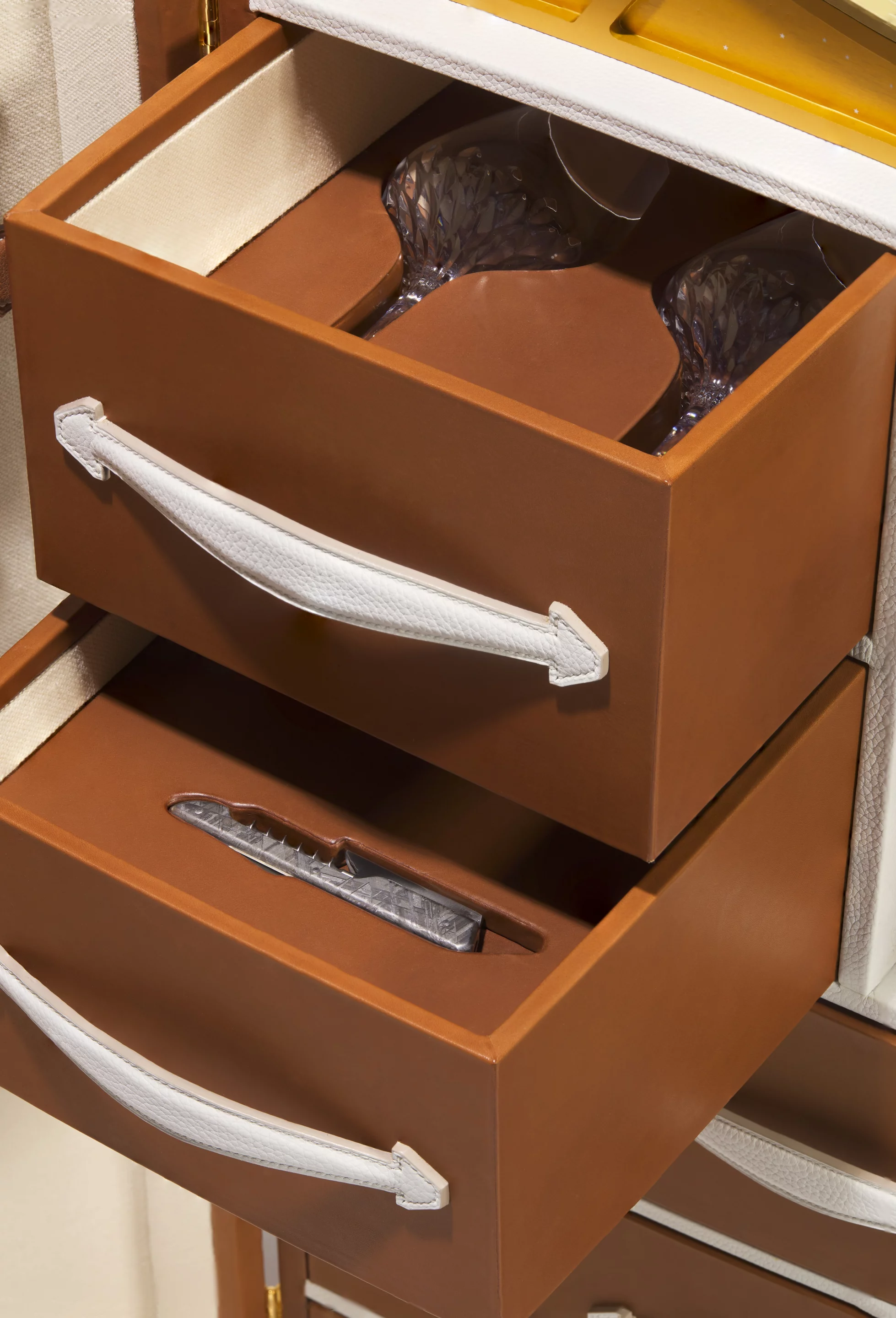 The box includes glasses and a corkscrew forged from a meteorite