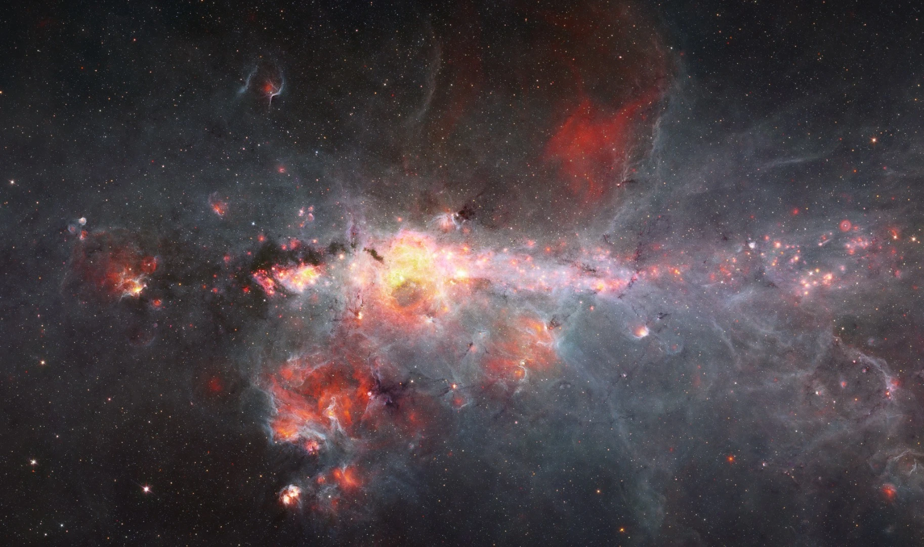 Dust and Gas in the Milky Way Center