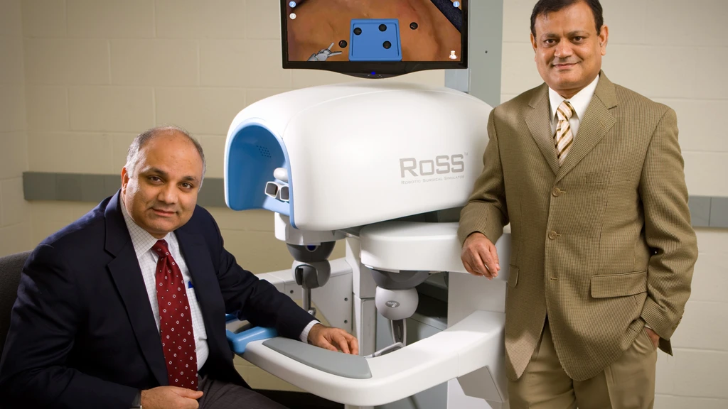 HOST developers Khurshid Guru, MD, (left) and Thenkurussi Kesavadas, PhD