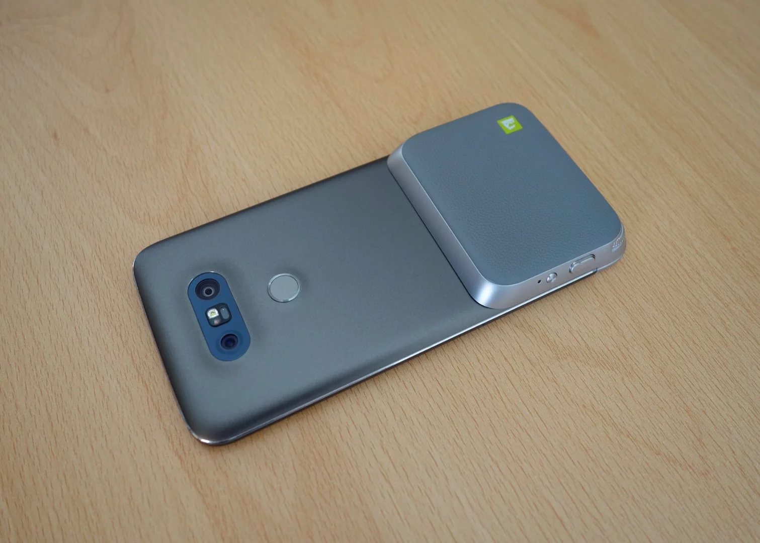 The Cam Plus brings buttons for taking snaps and videos, zooming in and out, and launching the camera