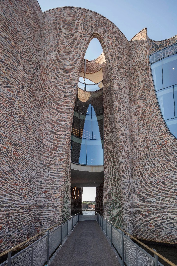 The building is accessed from land by a short footbridge