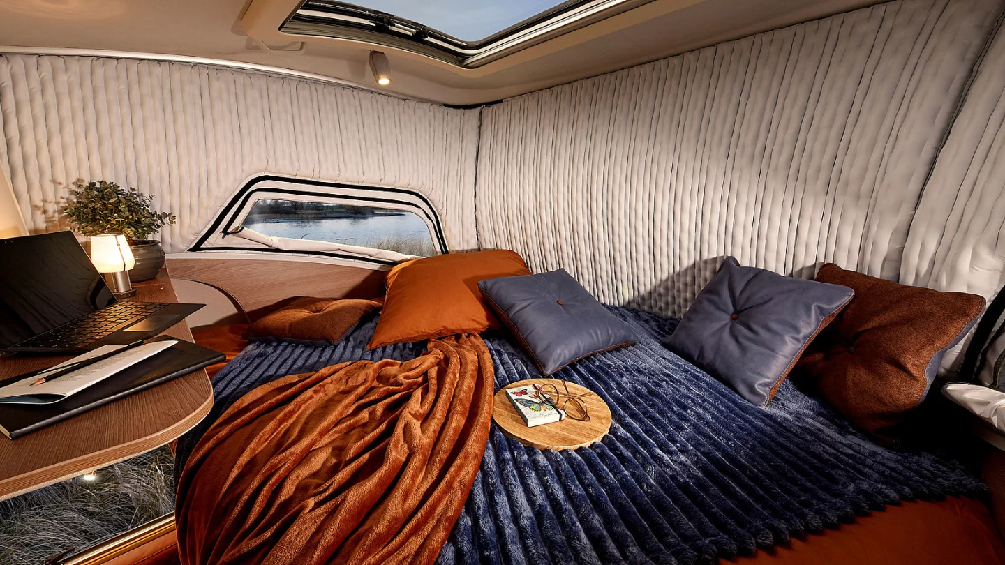 The more compact Bürstner Lyseo GalleryLyseo models have only a storage space over the driver cab, but the Lyseo Gallery inflates the space into a full bedroom and mini-office