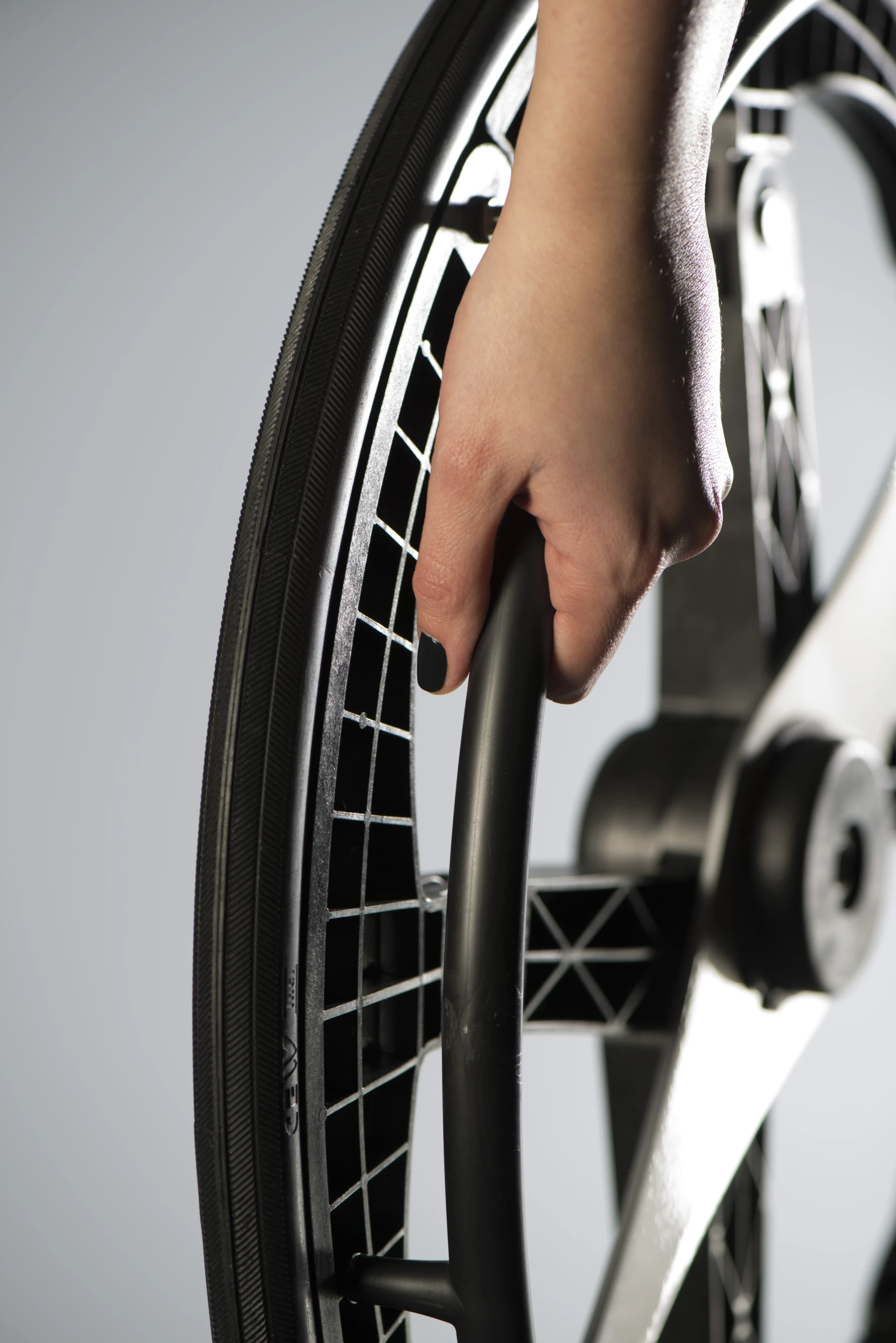 Each wheel is constructed from glass filled nylon, with a polypropylene hand rim, and solid tire
