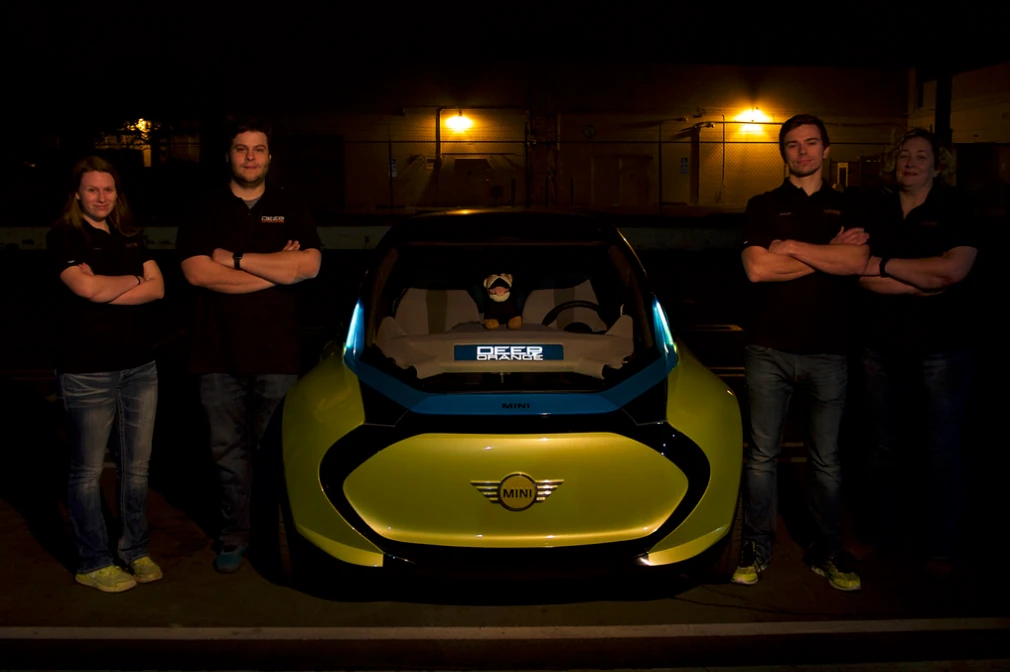 Team members pose with the Deep Orange 7 Mini
